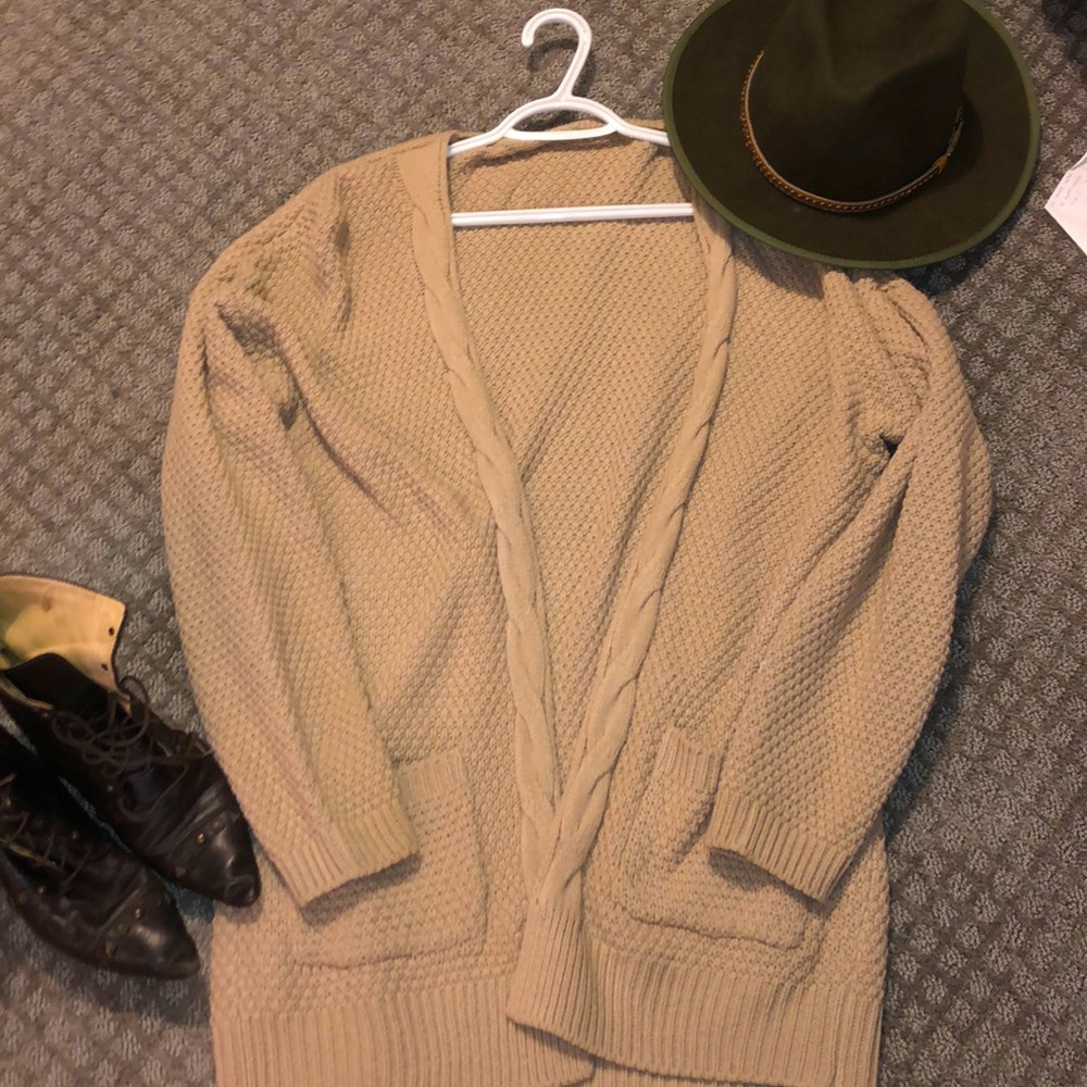 Beige women’s knitted sweater